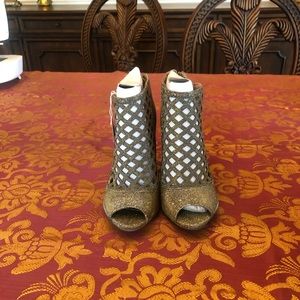 Christian Soriano Silver Blingy Boot with 4” Heel with Zipper Close Size 8.  NWT